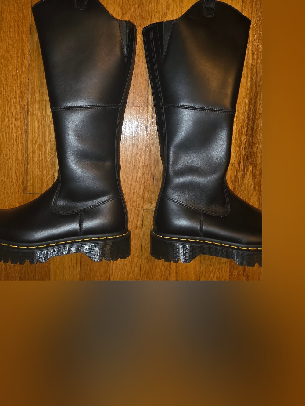 Dr. Martens Black Tall Lug-Sole Boots with Yellow Stitching